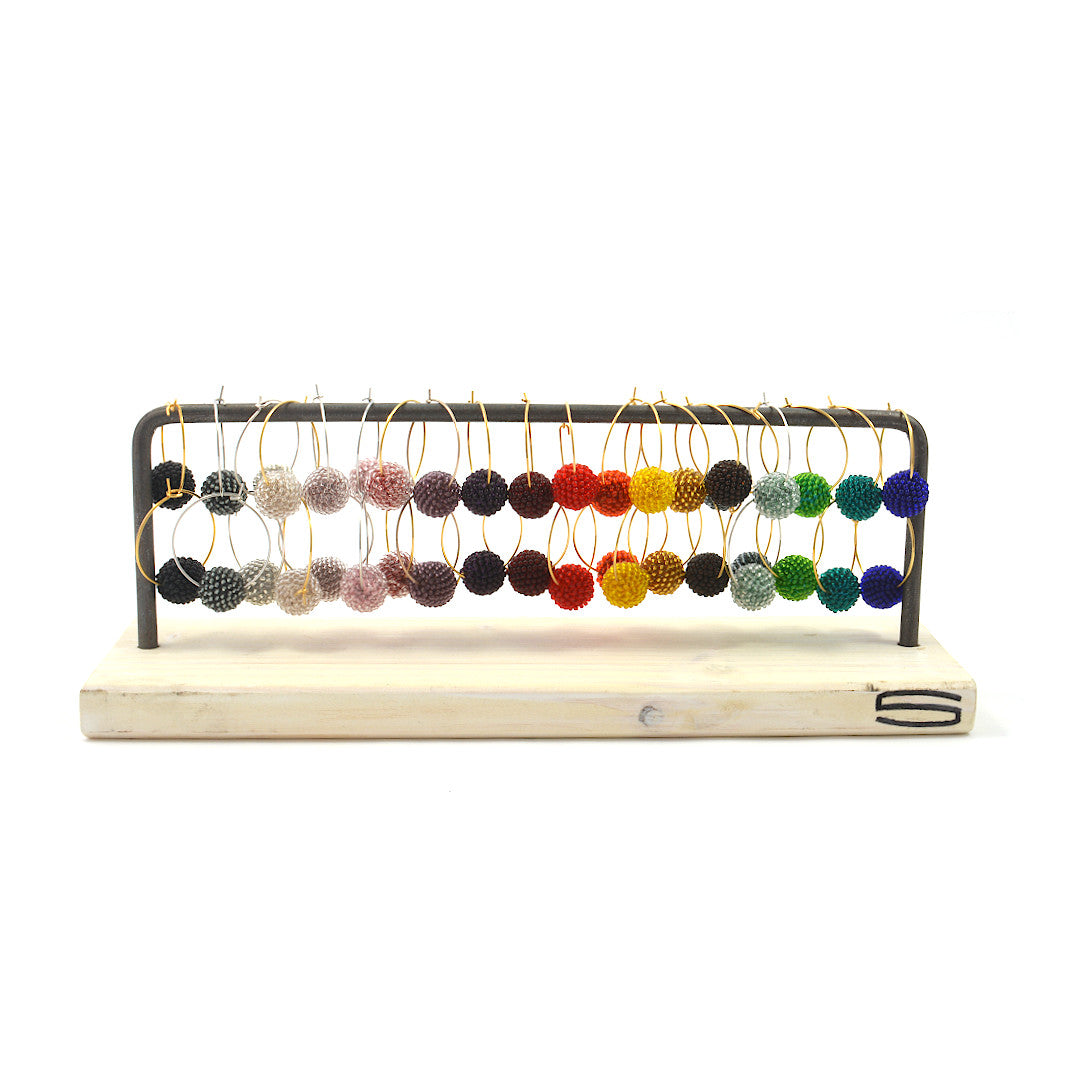 display for "Svelte" bracelets and hoop earrings